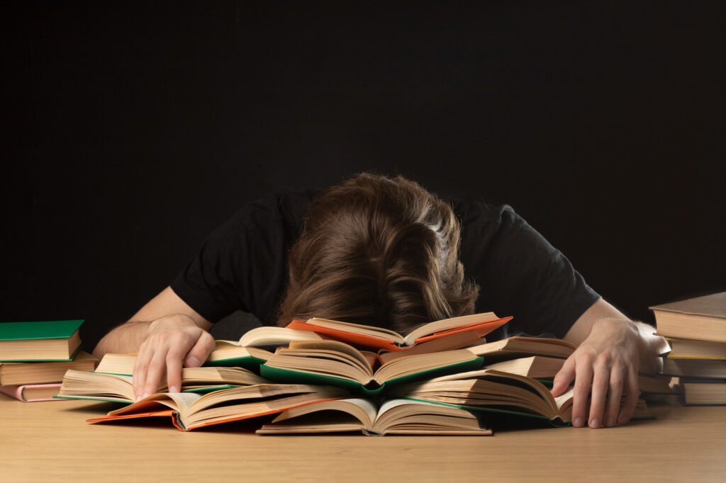 Exhaustion and stress of a student while studying.